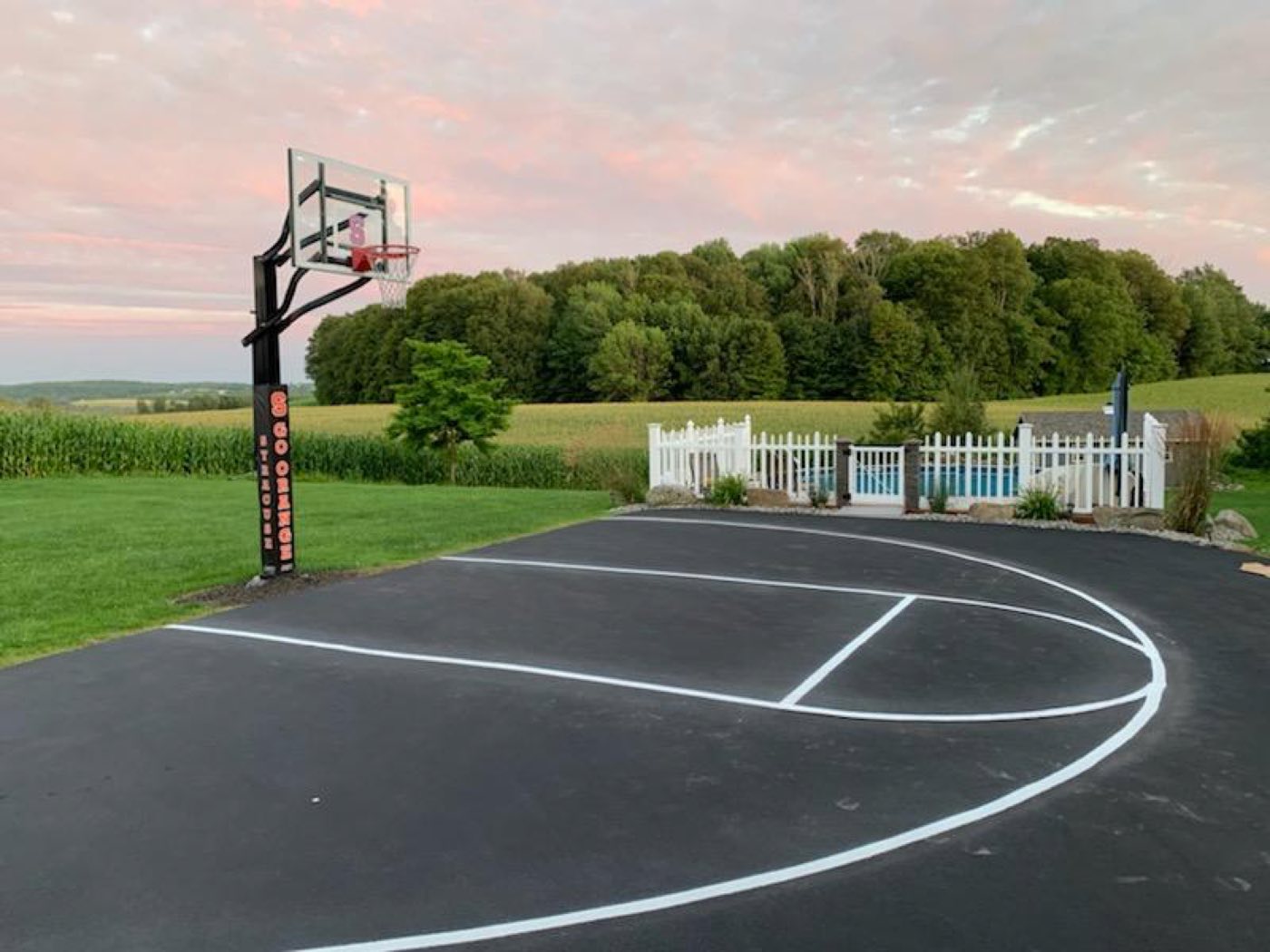 Backyard basketball court with crisp white lines