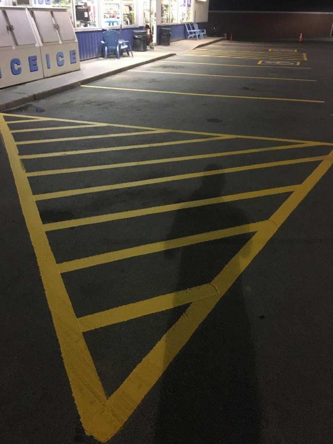 Yellow hatched no-parking zone painted at Reilly's Dairy in Sauquoit